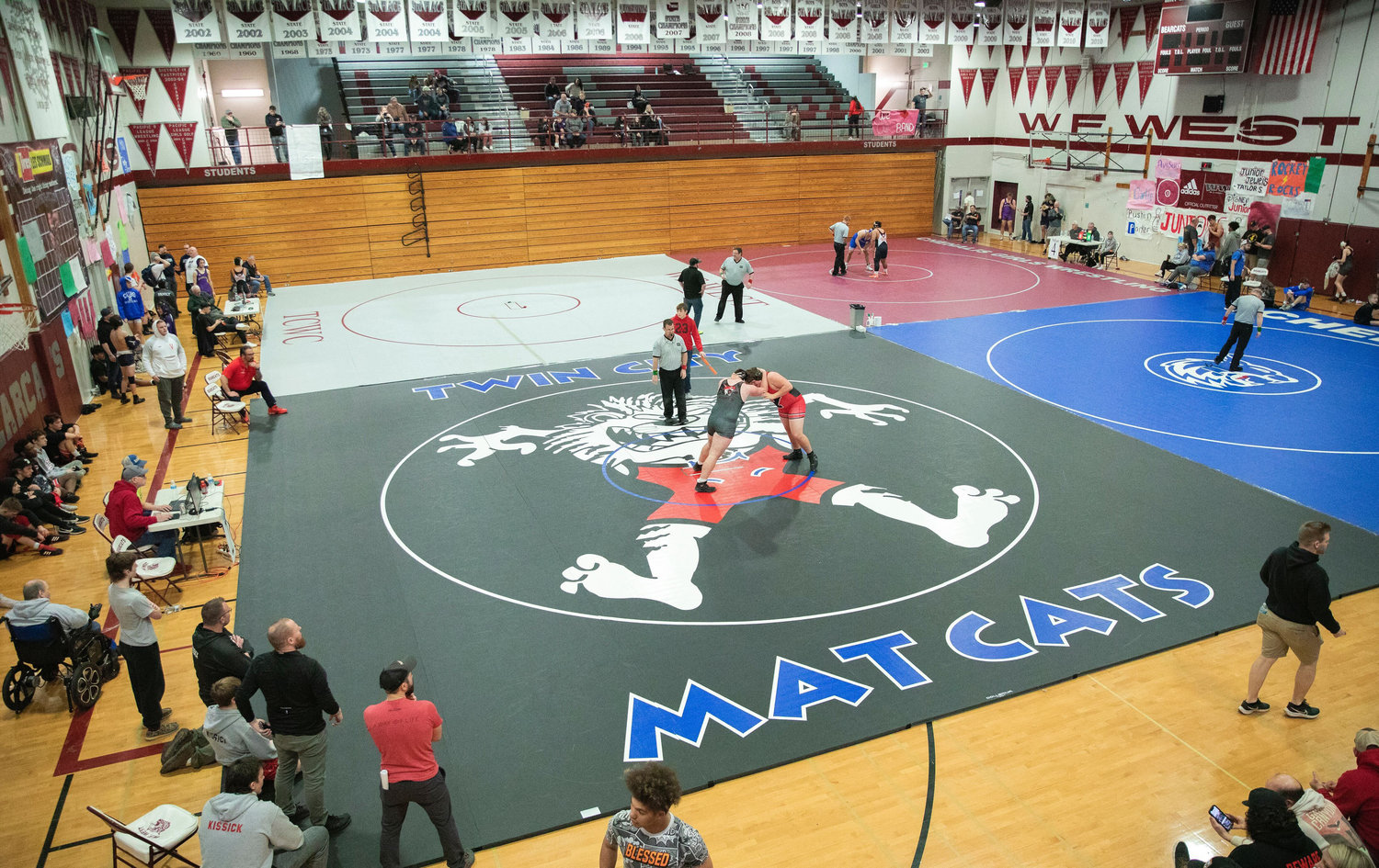 Athletes wrestle during the Bearcat Invitational on Saturday at W.F. West High School in Chehalis.